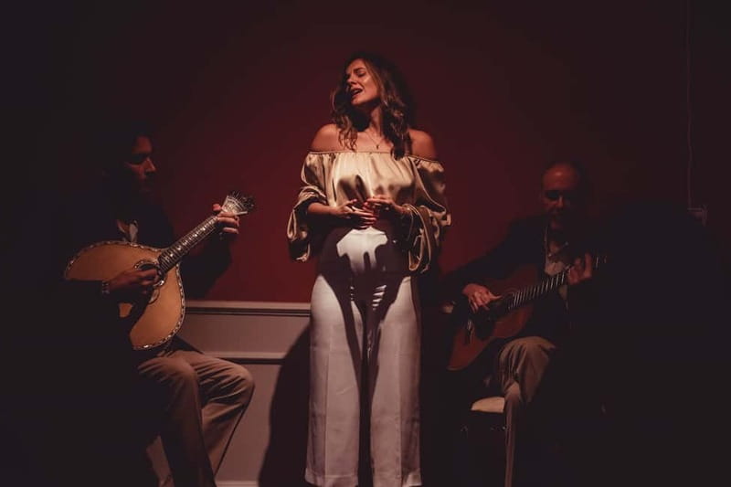 Lisbon: Live Fado Show with Port Wine in Historic Center - The singers, musicians, and audience connection