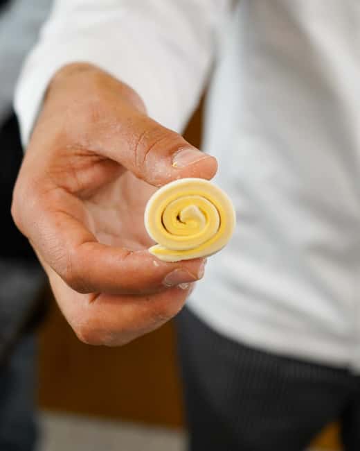 Lisbon: Pastel de Nata Masterclass at a Real Bakery - Shaping three pastel de nata by hand
