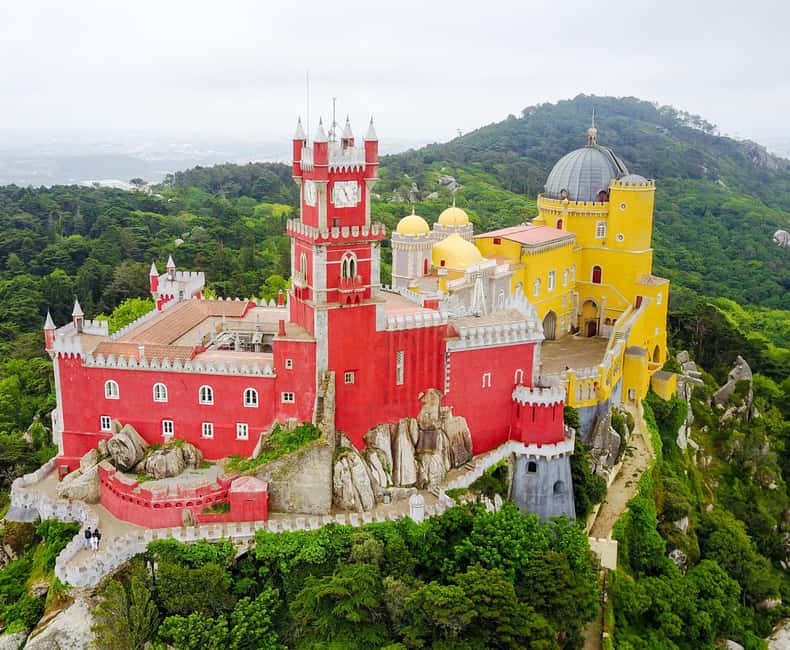 Lisbon: Pena Palace, Sintra, Cabo da Roca & Cascais Day Tour - Pena Palace, colorful but viewed from outside
