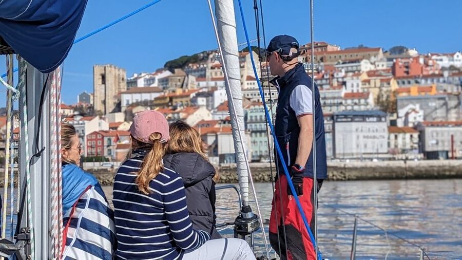 Lisbon: Private Boutique Boat Tour – Sail in Style - Passing beneath the 25 de Abril Bridge
