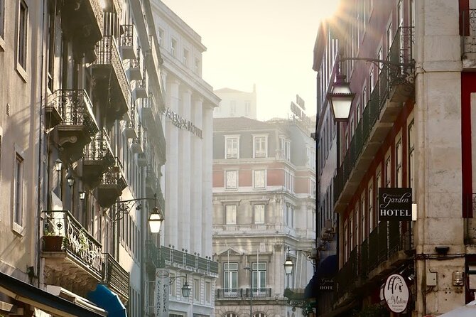 Lisbon Private Food Tour – Taste 10+ Local Dishes & Wines - Baixa, the Santa Justa Lift, and the city rebuilt