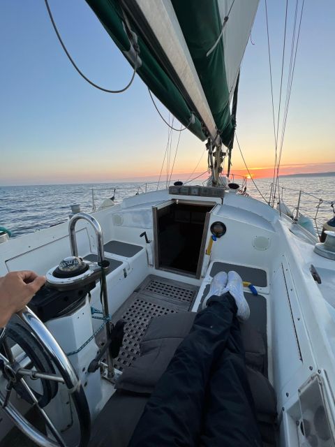 Lisbon: Private Sailing City & Sunset Tour - Sailing west to the Discoveries Monument and Belém Tower