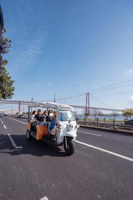 Lisbon: Private Tuk Tuk Tour with Optional Boat Cruise - The 8-hour Premium route: bridge, beach, village, and boat