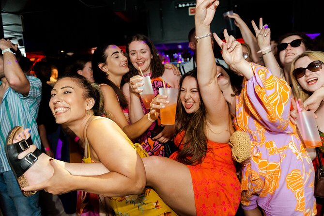 Lisbon: Pub Crawl with Open Bar, Shots & VIP Club Entry - Cais do Sodre leads toward the club