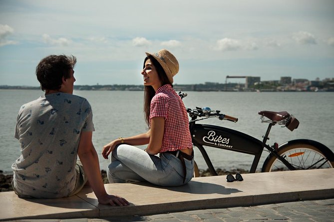 Lisbon Regular or Electric Bike Rental - Alfama, the Sé Cathedral, and tram traffic