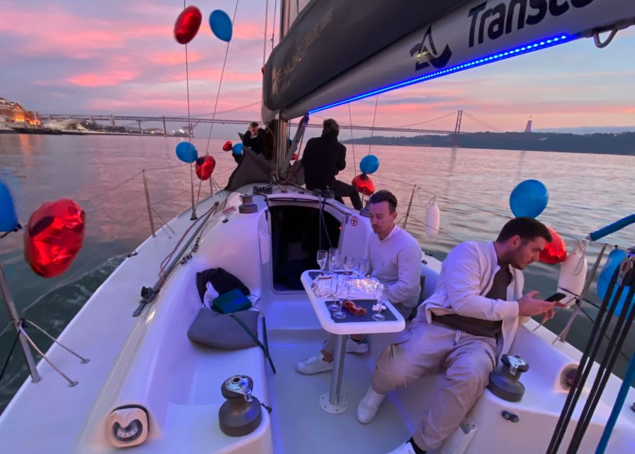 Lisbon: Sailboat Tour w/ Local Guide and Open Bar Green Wine - Meeting the crew beneath the 25 de Abril Bridge