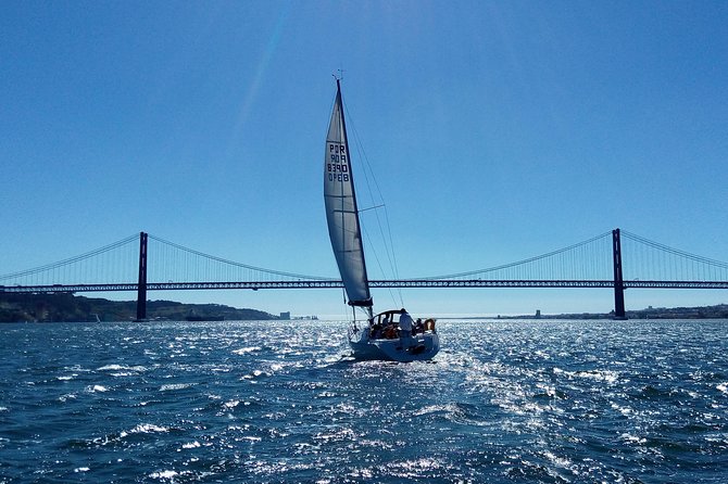 Lisbon Sailing Tour on a Luxury Sailing Yacht with 2 Drinks - A pause for Portuguese cheese, chouriço, and drinks