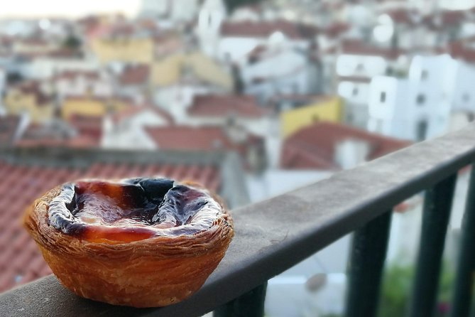 Lisbon Small-Group Food Tour with 18 Tastings in Alfama District - Food, wine, and the local businesses