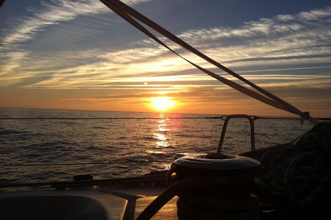 Lisbon Small Group Sunset Sailing 2h Cruise with Drinks Included - What the two hours feel like aboard