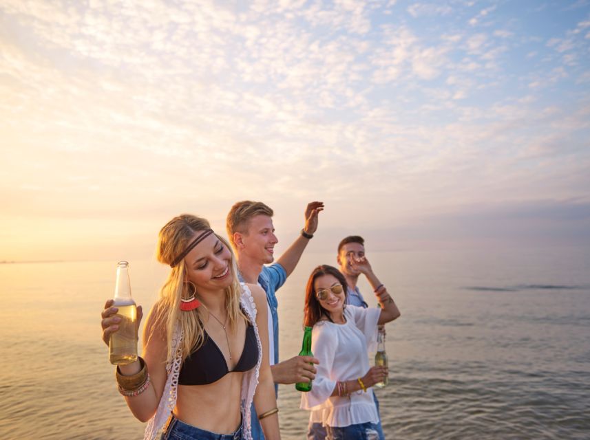 Lisbon: Sunset Boat Party Cruise with DJ and Open Bar - Christ the King and the open river