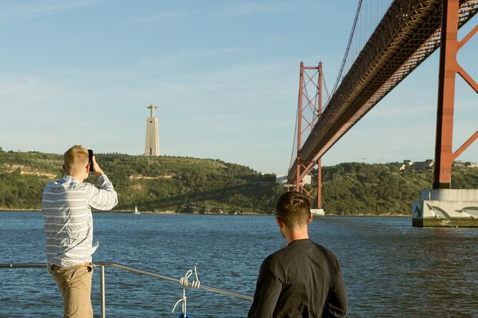 Lisbon: Sunset Catamaran Boat Tour with Music and Drinks - Starting at Doca de Santo Amaro