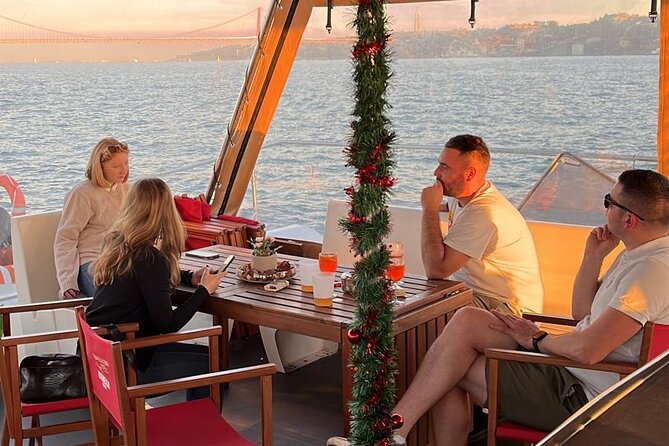 Lisbon: Sunset Catamaran Boat Tour with Music and Drinks - Music, Drinks, and the Evening Mood
