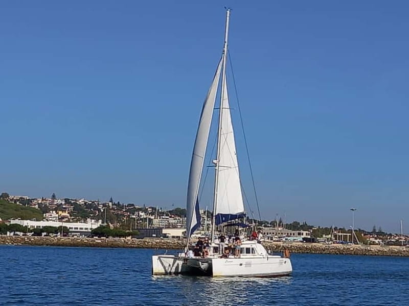 Lisbon: Sunset Catamaran Cruise with Drinks - Almada, Cristo Rei, and the 25 de Abril Bridge