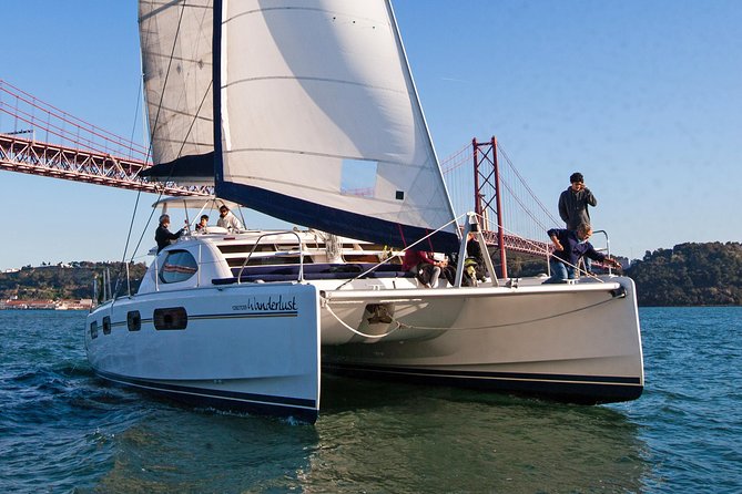 Lisbon: Sunset Cruise With Drinks on Spacious Yacht - Christ the King and the Modern Riverfront