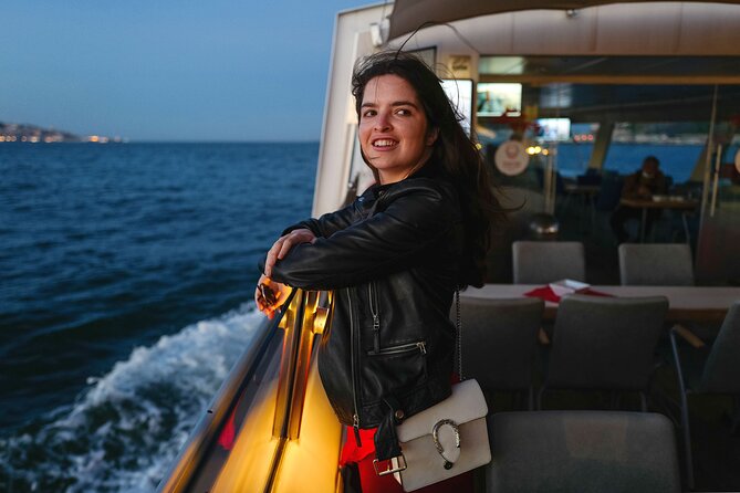 Lisbon Sunset cruise with Welcome Drink and Snack included - Christ the King across the Tagus