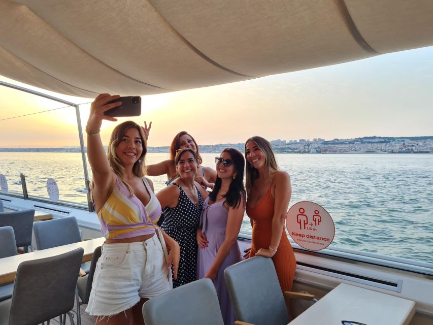 Lisbon: Sunset Cruise with Welcome Drink and Snacks - Under the 25 April Bridge