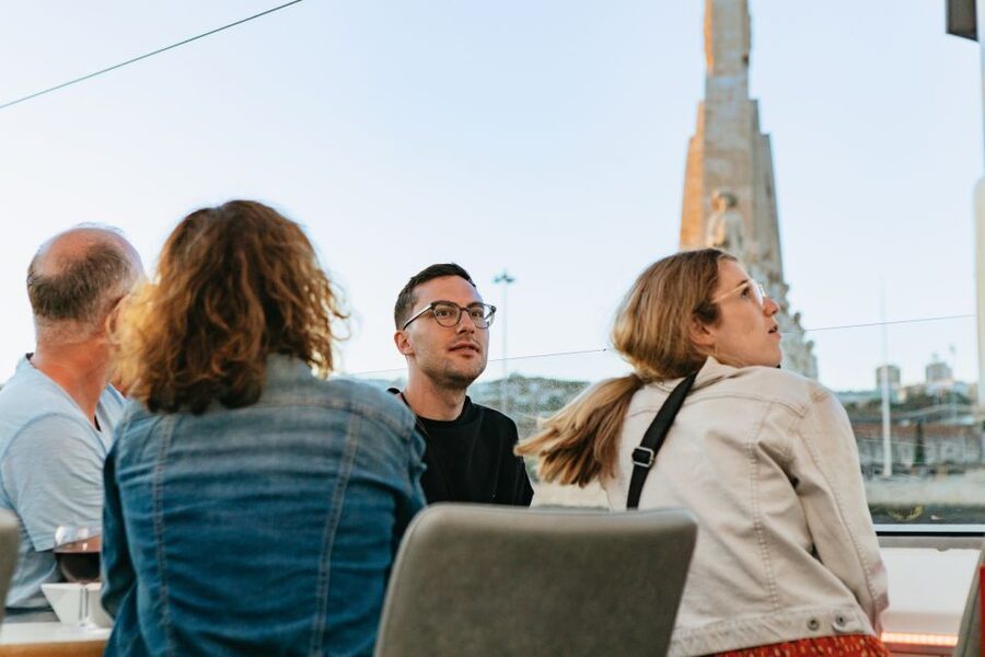 Lisbon: Sunset Cruise with Welcome Drink and Snacks - Drinks, snacks, music, and the onboard setup