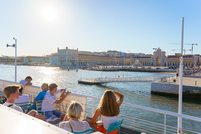 Lisbon Sunset Cruise with Wine and Snacks - Wine, drinks, and the included snacks