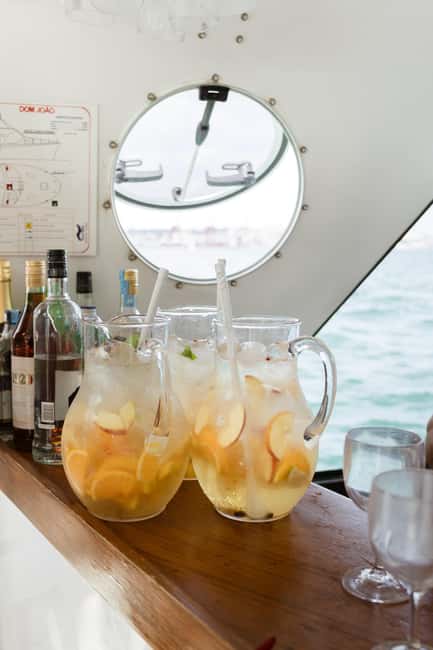 Lisbon: Sunset/Night Boat Party with Open Bar, Snacks & DJ - The waterfront between Alcântara and Belém