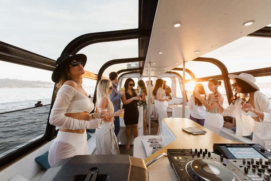 Lisbon: Sunset/Night Boat Party with Open Bar, Snacks & DJ - Belém from the river