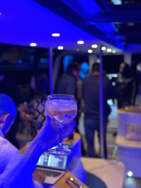 Lisbon: Sunset/Night Boat Party with Open Bar, Snacks & DJ - The sunset view near Belém Tower