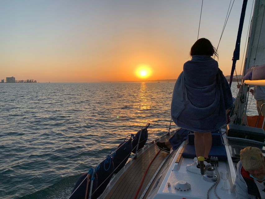 Lisbon: Sunset Sailing Cruise with Wine - Sunset, wind, and the practical side of comfort