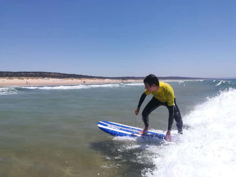 Lisbon: Surfing Lesson on Costa de Caparica Beach - Getting fitted with the board and wetsuit