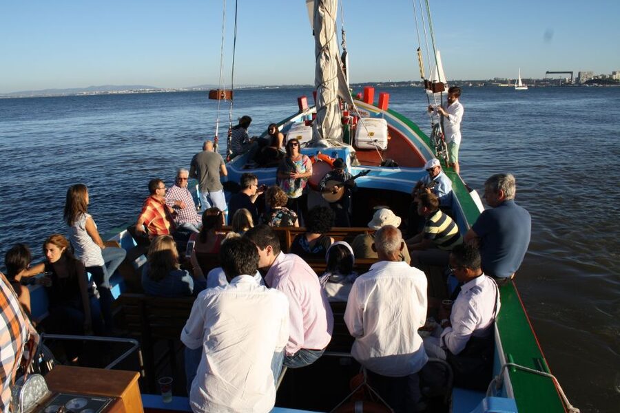 Lisbon: Tagus River Sunset Cruise in a Traditional Vessel - Passing Praça do Comércio from the water