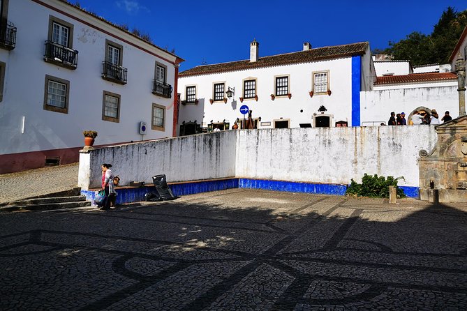 Lisbon to Porto Up To 5 Stops Óbidos Nazaré Fátima Coimbra Aveiro - A private day with room for personal choices