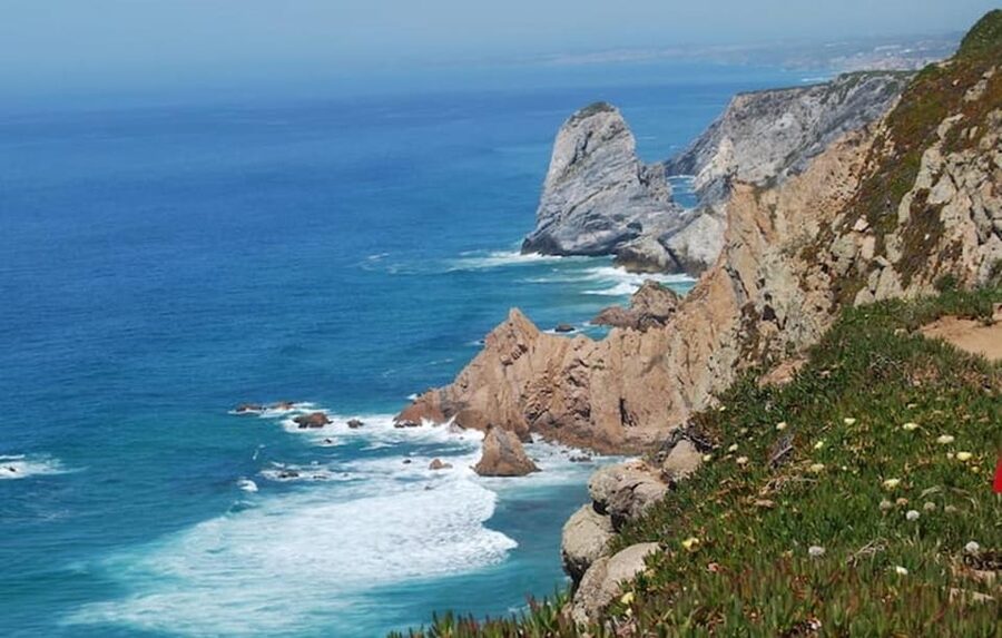 Magical Day Trip: Pena Palace, Sintra, CaboDa Roca & Cascais - Quinta da Regaleira rewards curious walkers