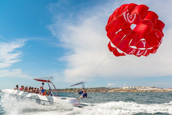 Parasailing from Albufeira Marina by Boat - Clothing, water, and practical comfort