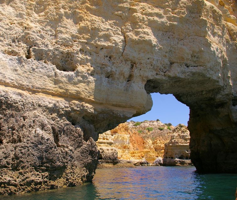 Portimão: Pirate Ship Cave Cruise - The trip back, dolphins, and sunset light