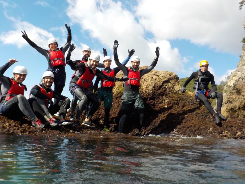 Portinho da Arrábida: Coasteering Boat Tour - Rappelling down the cliffs