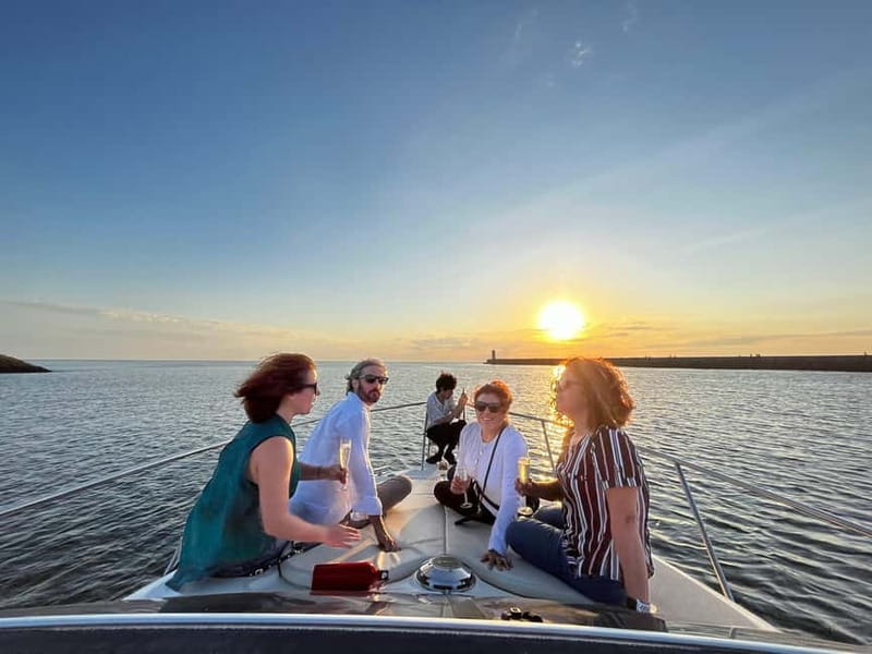 Porto: 6 Bridges Yacht Cruise with Local Wine & Snacks - What the crew adds to the outing