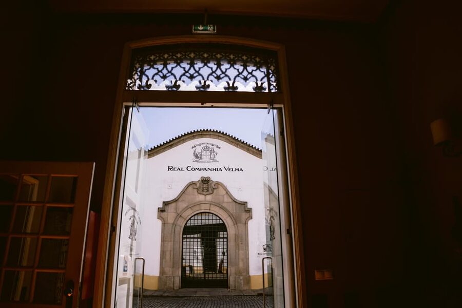 Porto: Carvalhas cellar tour at Real Companhia Velha - Casks, vats, and barrels in the dark