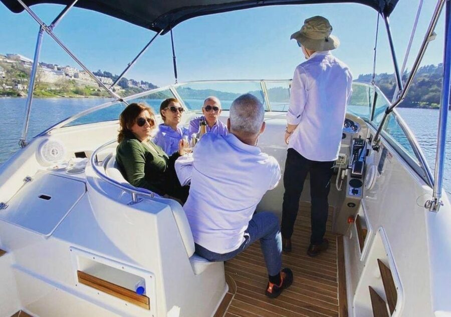 Porto: Douro River Boat Tour w/ Portuguese Wines & Tasting - Boarding the 27-foot SMILE yacht