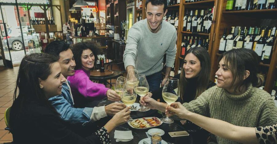 Porto: Evening Local Food Crawl with Drink Pairings - Clérigos and Cedofeita between bites