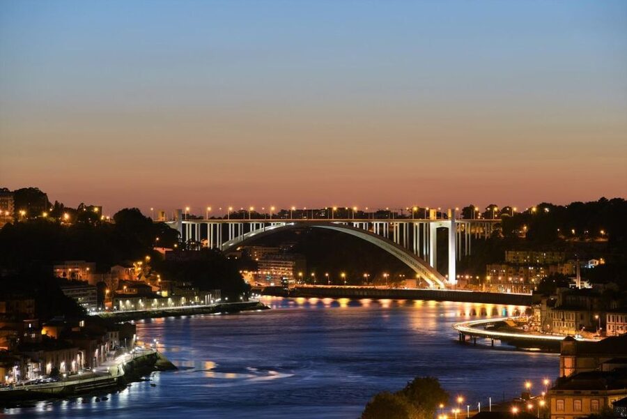 Porto Fado Night Show + Dinner - Dinner with Porto lights below