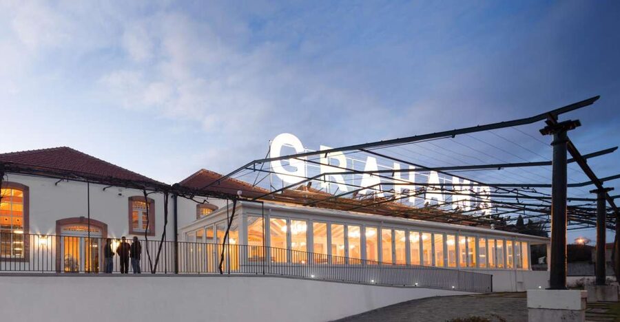 Porto: Graham's Port Lodge Tour & Vintage Room Wine Tasting - Walking through the barrel room