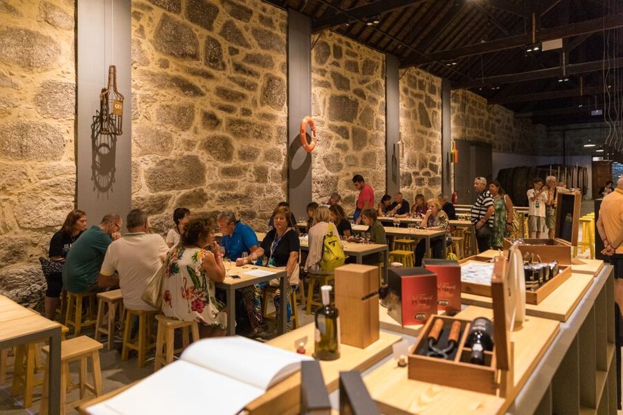 Porto: Guided Tour and Tasting of 3 Port Wines at Poças - Entering the Cellar and Meeting the Port Story