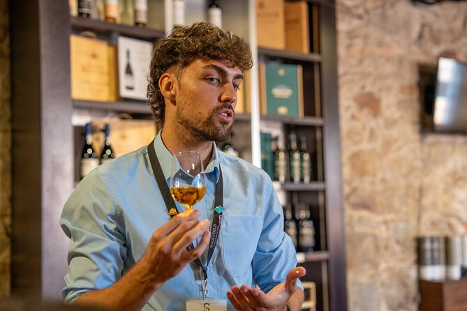Porto Half-Day Guided Historical Tour with Port Cellar Visit and Tasting - Santa Catarina adds a glimpse of old Porto life