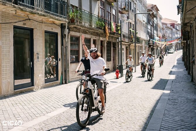 Porto Highlights in 3 Hours E-Bike Tour - Historical, Sightseeing - São Bento Station turns history into tilework