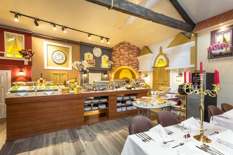 Porto: Magic Train Tour and Port Wine Cellar with Tastings - Inside Real Companhia Velha’s old cellar