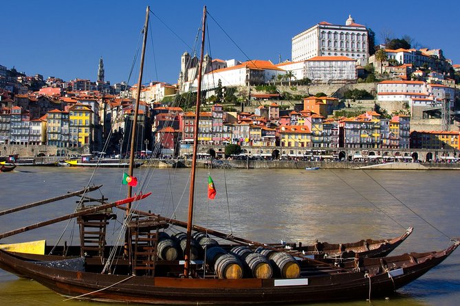 Porto Private Tour from Lisbon with Douro Cruise and Wine Tasting - Crossing Dom Luís I Bridge and reaching Ribeira