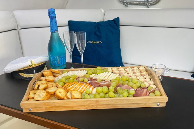 Porto: Private Yacht Cruise with Local Wine, Snacks and 6 Bridges - Wine, Port, and the food served onboard