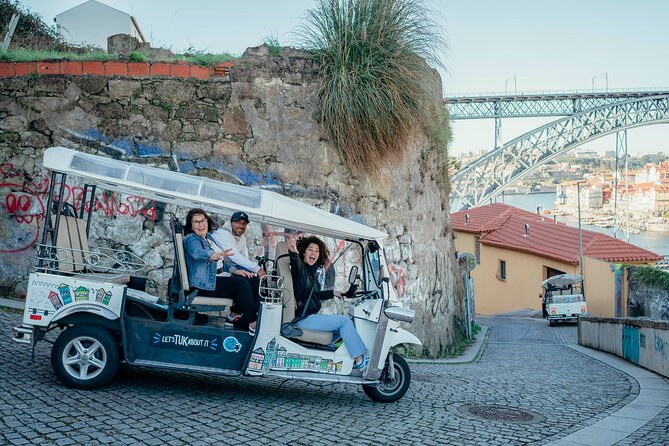 Porto Tuk Tuk: Clérigos, Seaside & Viewpoints - with Options - Bolsa Palace and the city’s trading past