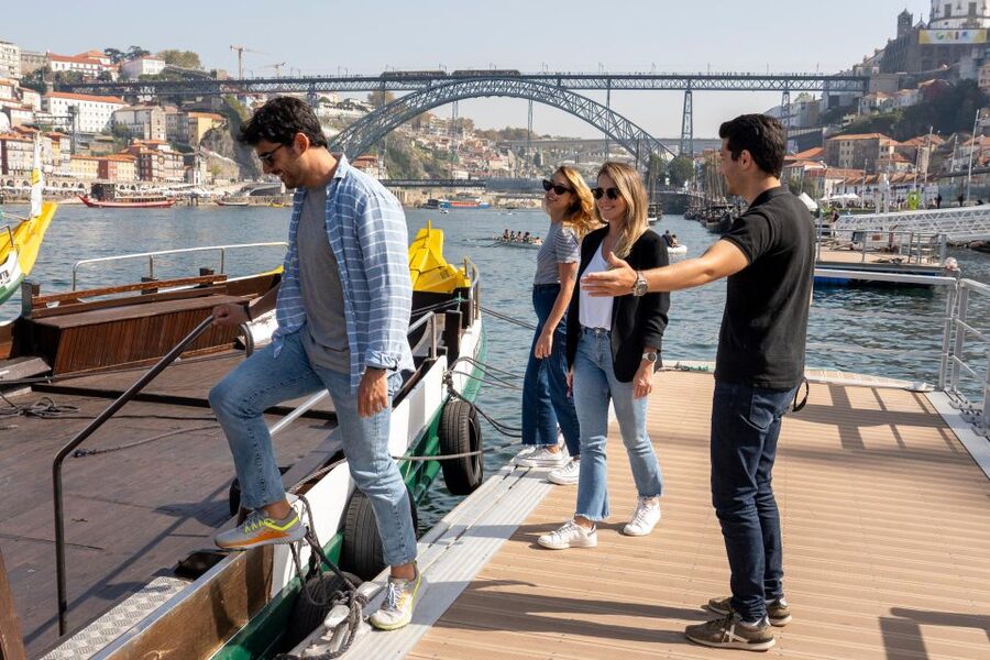 Porto: Walking Tour, Lello Bookshop, Boat and Cable Car - Crossing toward Dom Luís I Bridge