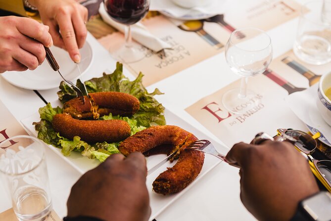 Porto Wine & Dine: Port Wine Cave Food Tour with Eating Europe - Alheira and the stories behind Portuguese food