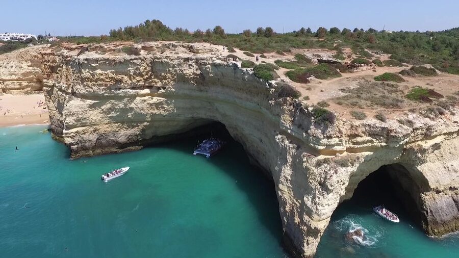 Quarteira: Benagil Cave Guided Catamaran Day Cruise & Drink - The return ride, included drink, and possible swim