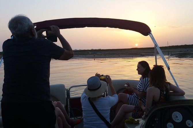 Ria Formosa Boat Sunset Islands Tour from Faro - Watching the sunset from the water